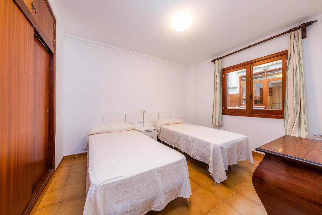 Postel nebo postele na pokoji v ubytování Vives