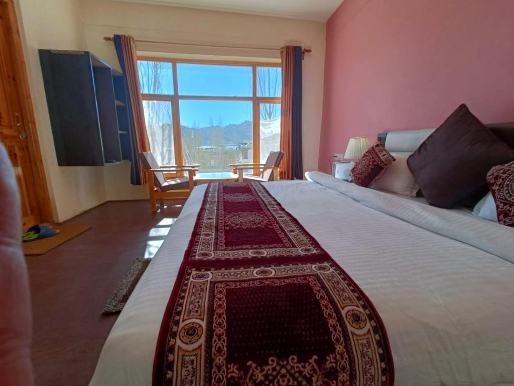 Letto o letti in una camera di Glacier View Guest House