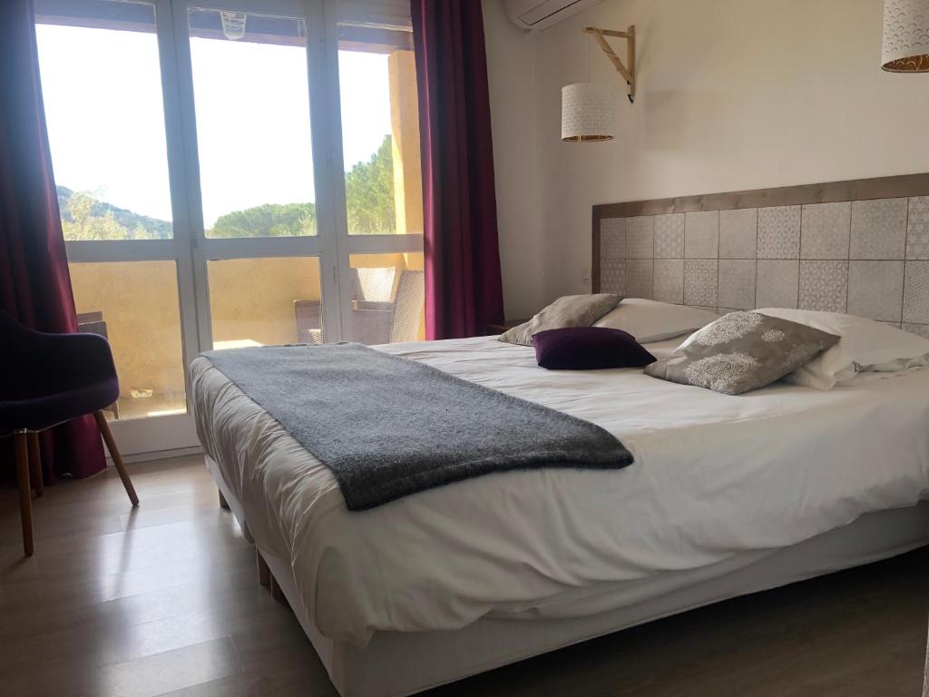 Postel nebo postele na pokoji v ubytování La Picholine en Provence