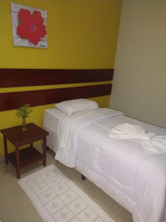 Postel nebo postele na pokoji v ubytování Pousada Rio Bracuhy