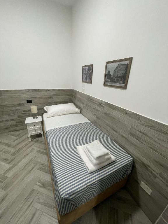 Postel nebo postele na pokoji v ubytování Holiday Rooms Rho