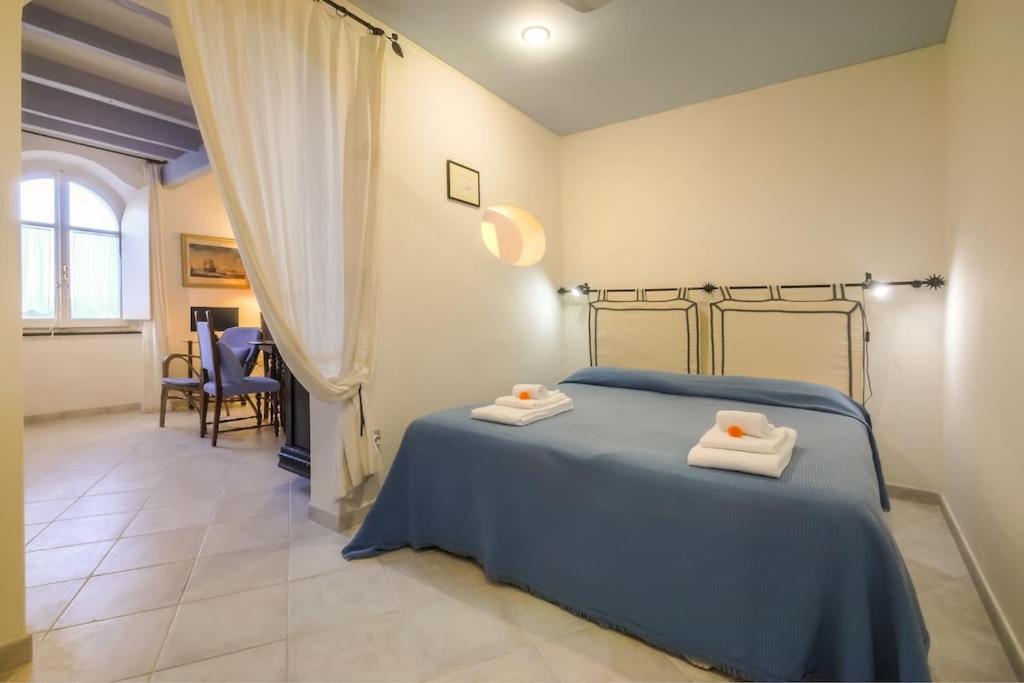 Posteľ alebo postele v izbe v ubytovaní Alghero Fish House
