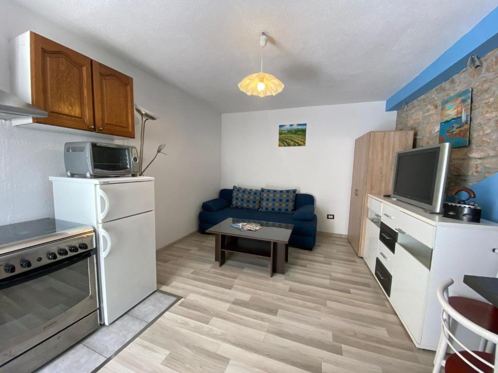 Kuchyňa alebo kuchynka v ubytovaní Studio apartment Elsa