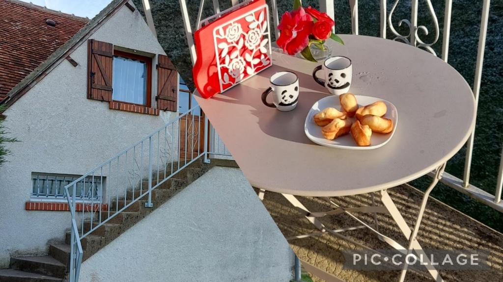 a bowl of food on a table on a balcony at Le Nid de l'Ecureuil in Selles-sur-Cher