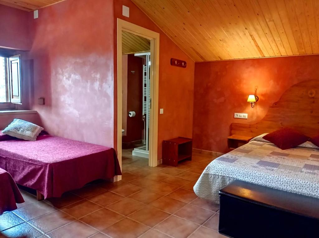 Postel nebo postele na pokoji v ubytování Masia Rovira