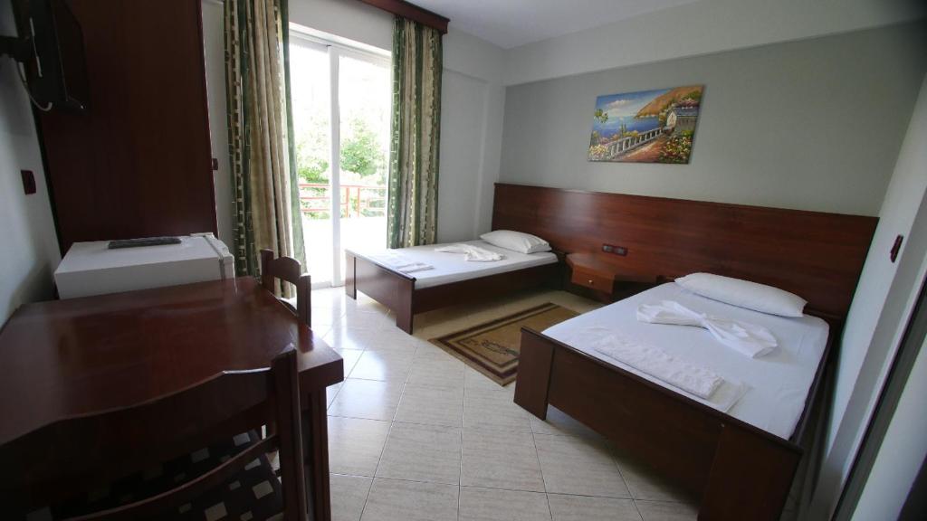 Postel nebo postele na pokoji v ubytování Hotel Venera