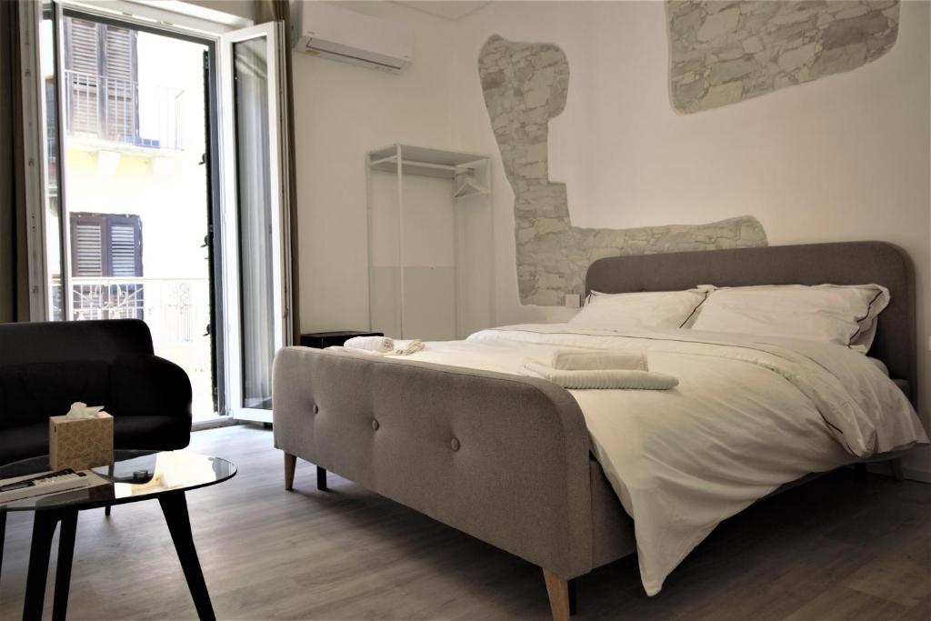 Postel nebo postele na pokoji v ubytování B&B Belvedere All'Idria