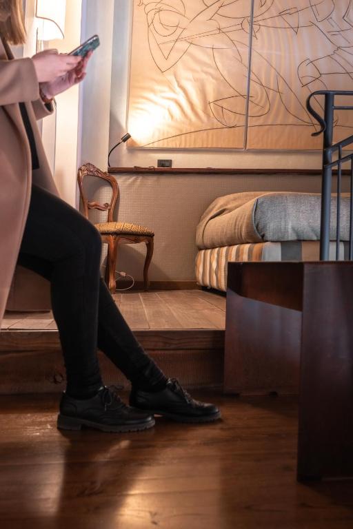 Postel nebo postele na pokoji v ubytování Hotel Della Fortezza