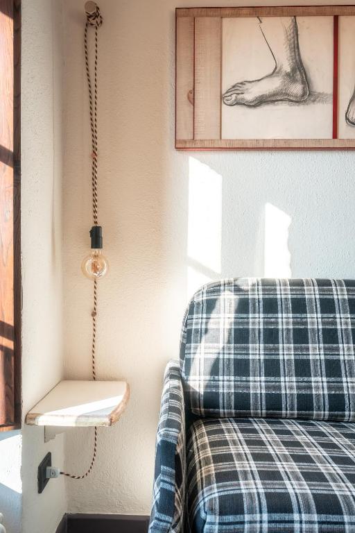 Postel nebo postele na pokoji v ubytování Hotel Della Fortezza