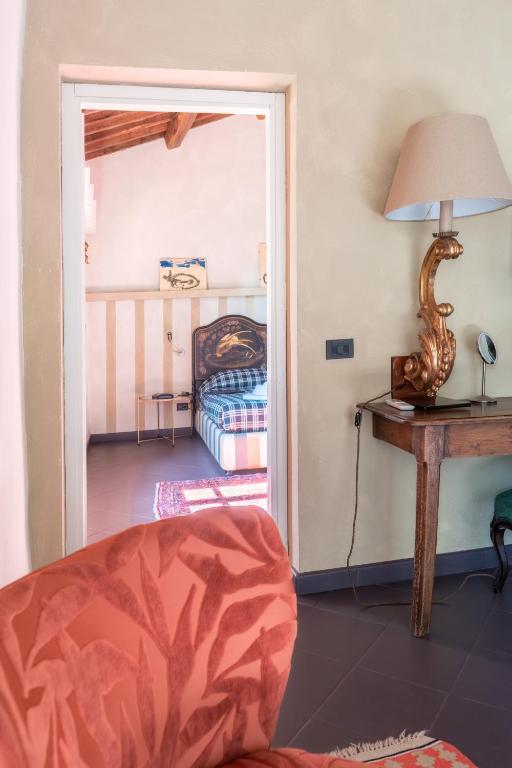 Postel nebo postele na pokoji v ubytování Hotel Della Fortezza