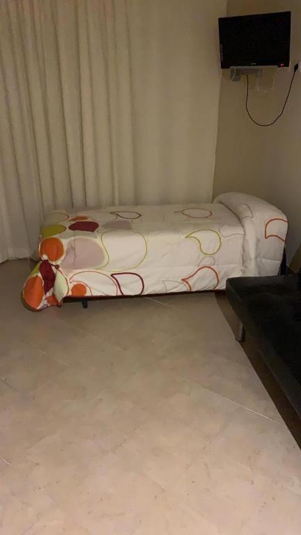 Postel nebo postele na pokoji v ubytování RAQUEL'S - Habitacions i Apartaments turístics -