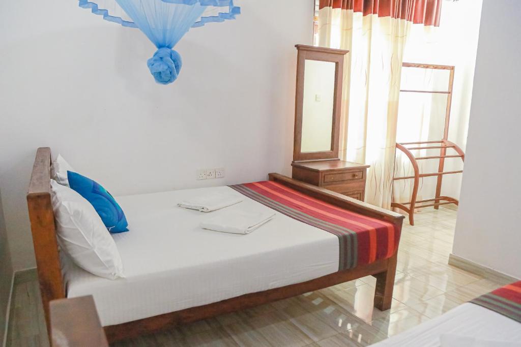 Postel nebo postele na pokoji v ubytování Lakeside Villa