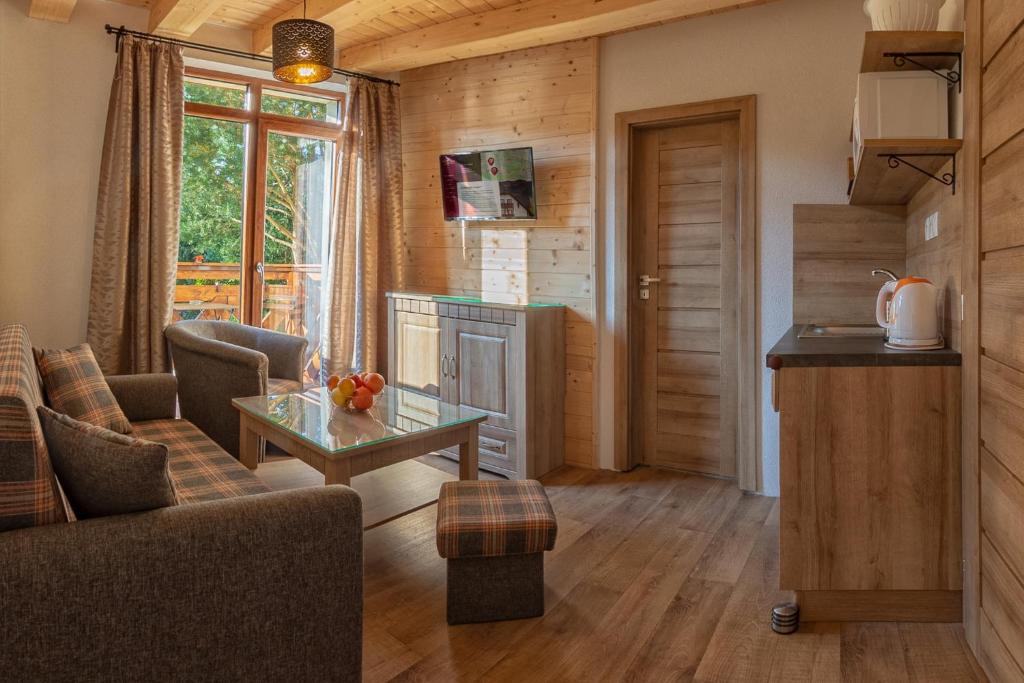 Kuchyň nebo kuchyňský kout v ubytování Apartmány a Štúdia Villa Flora
