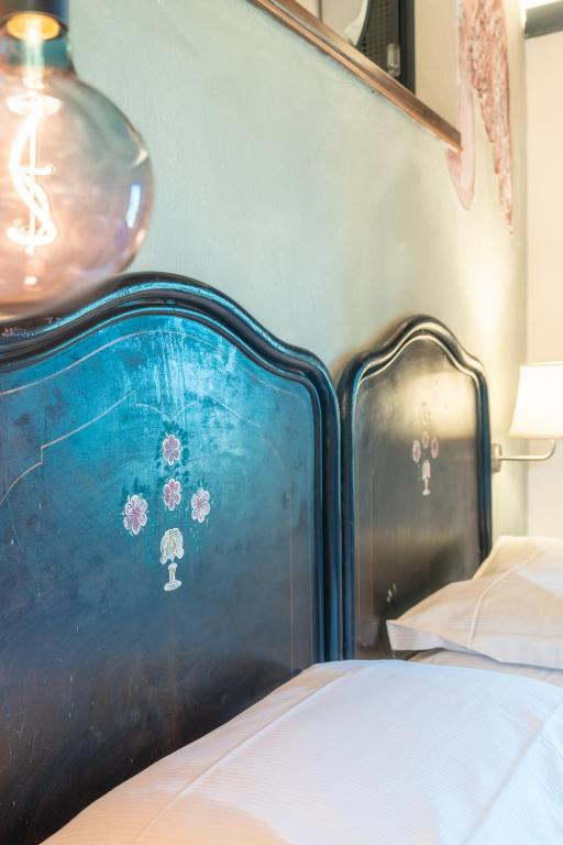 Postel nebo postele na pokoji v ubytování Hotel Della Fortezza