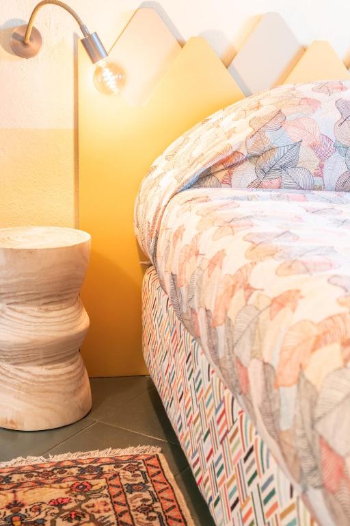 Postel nebo postele na pokoji v ubytování Hotel Della Fortezza
