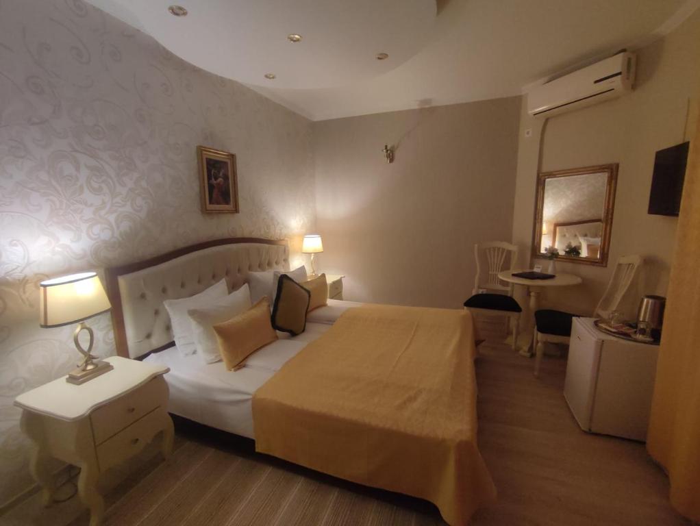 Postel nebo postele na pokoji v ubytování Casa Alina