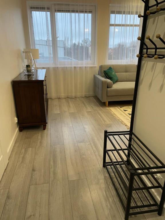 Posteľ alebo postele v izbe v ubytovaní Apartament Dziewiątka
