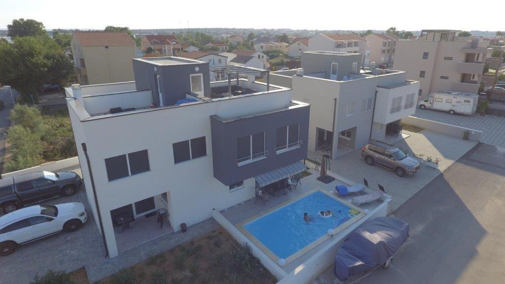 an overhead view of a house with a swimming pool at Villa Lana in Nin