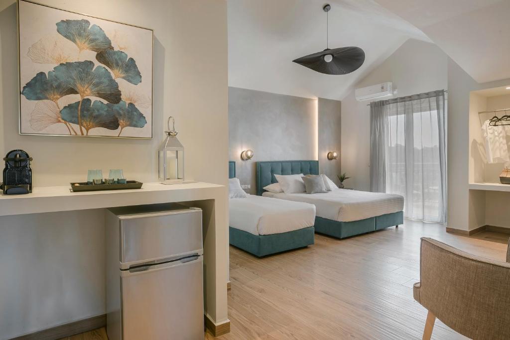 Postel nebo postele na pokoji v ubytování Socrates Apartments