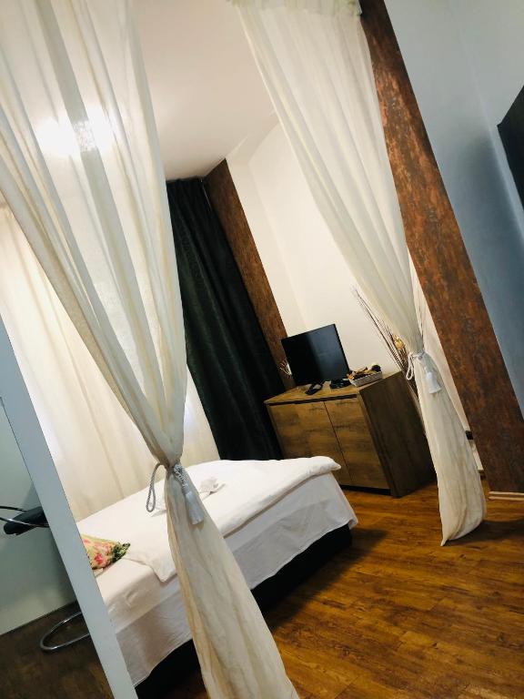 Postel nebo postele na pokoji v ubytování Luxury Apartments Zelny Trh 11