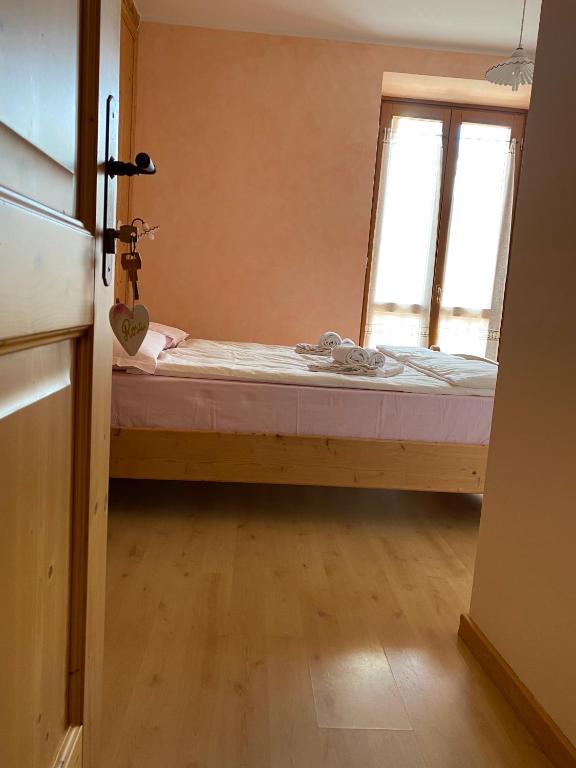 Postel nebo postele na pokoji v ubytování B&B Monte Tesobo