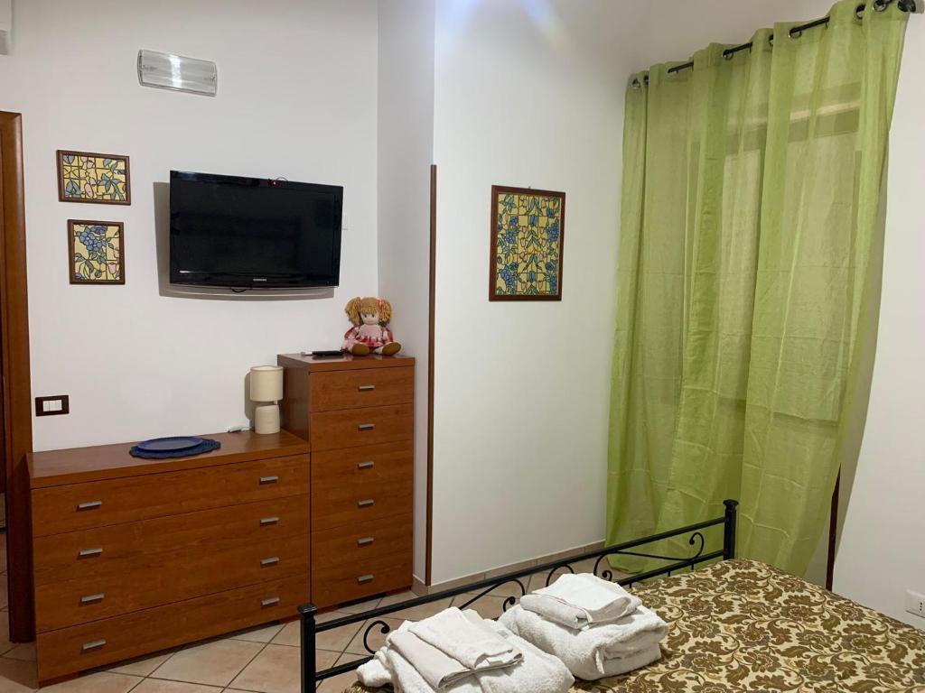 A bed or beds in a room at Casetta