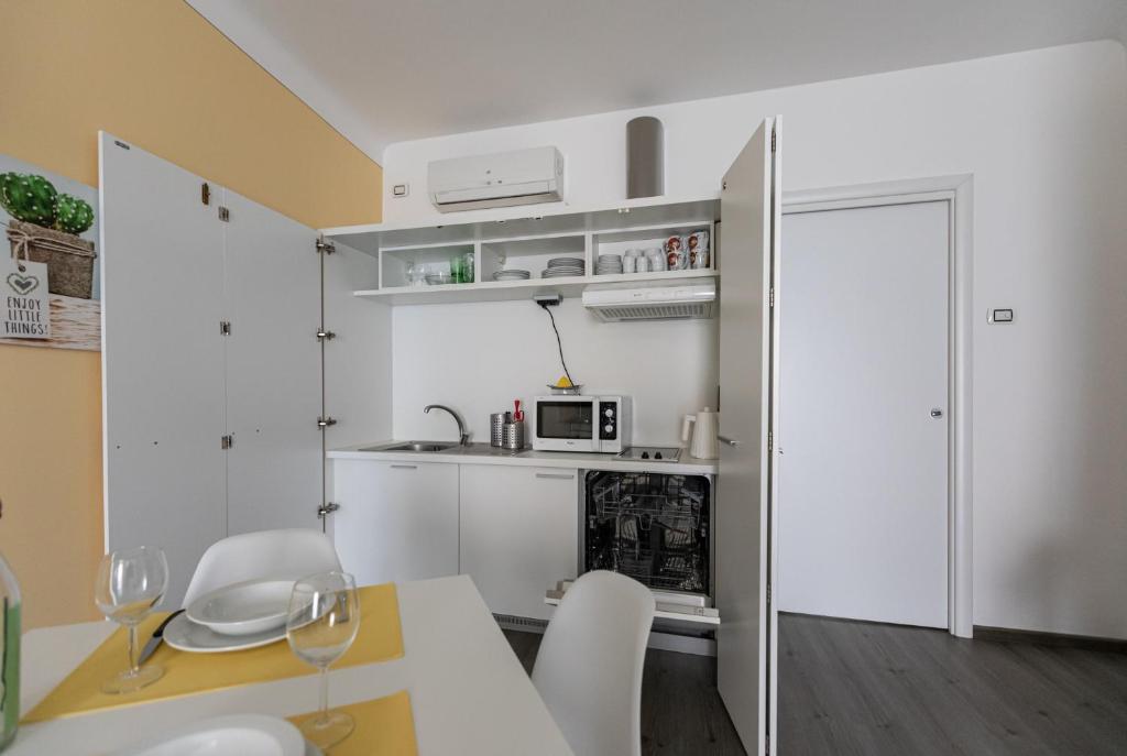 Kuchyň nebo kuchyňský kout v ubytování Stresa Residence