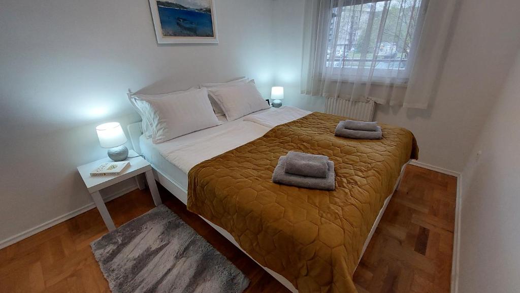 Posteľ alebo postele v izbe v ubytovaní APARTMAN MARIO - ARENA ZAGREB