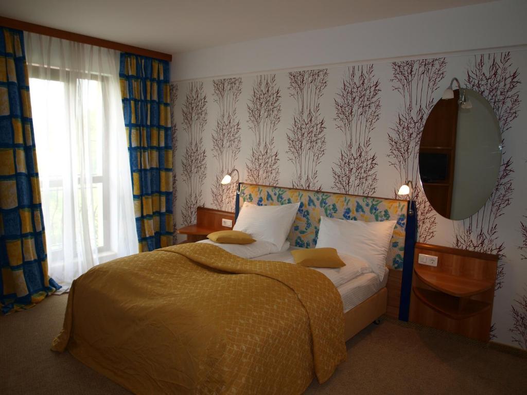 Postel nebo postele na pokoji v ubytování Hotel Doi Taurasi