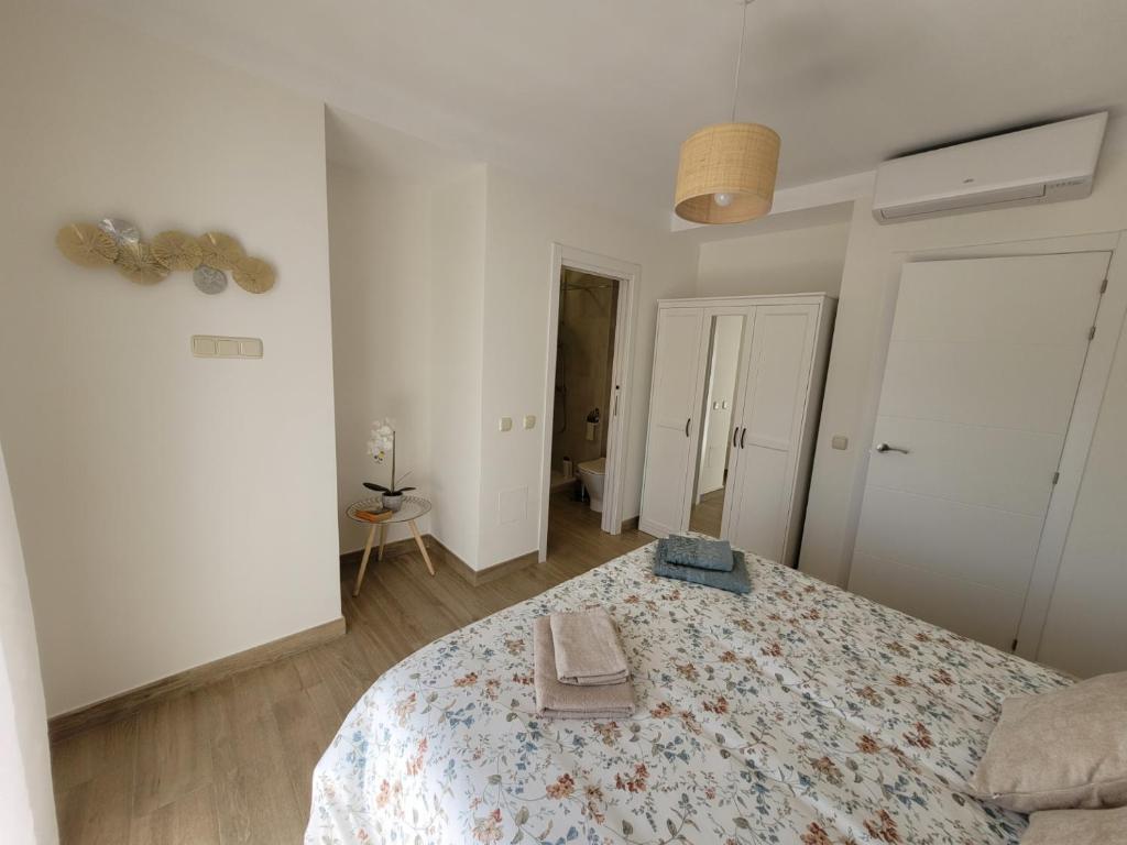Postel nebo postele na pokoji v ubytování Marbella Centro