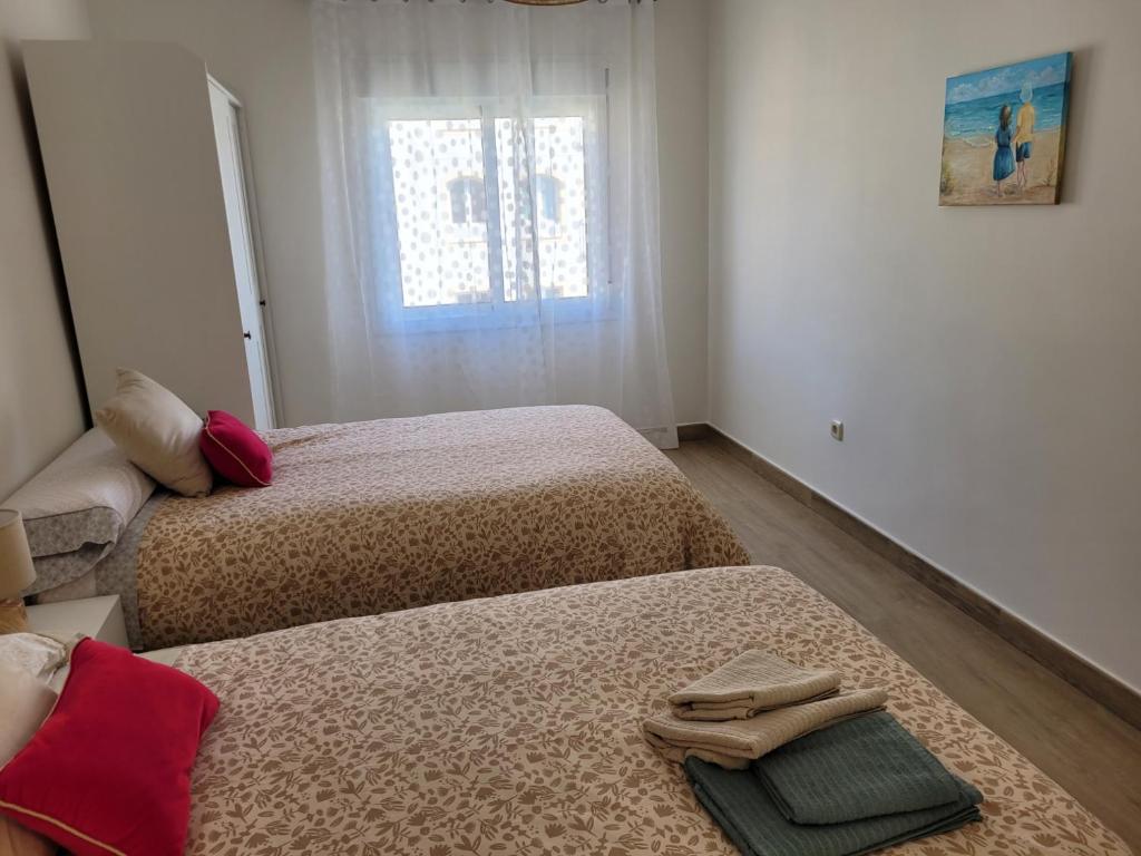 Postel nebo postele na pokoji v ubytování Marbella Centro