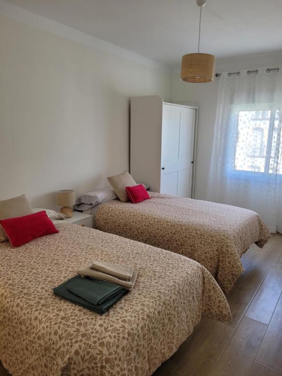 Postel nebo postele na pokoji v ubytování Marbella Centro