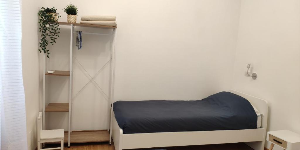 A bed or beds in a room at Terrazza di San Paolo
