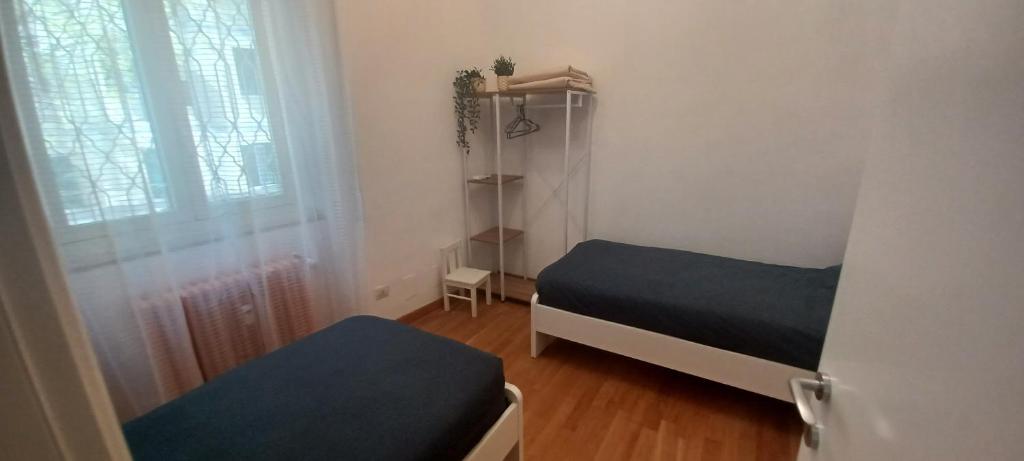 A bed or beds in a room at Terrazza di San Paolo