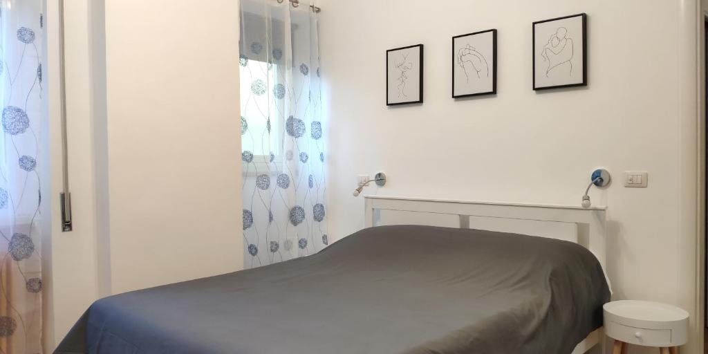 A bed or beds in a room at Terrazza di San Paolo