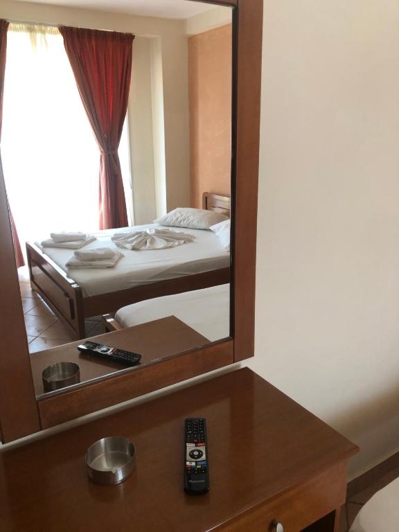 A bed or beds in a room at Panos Studios