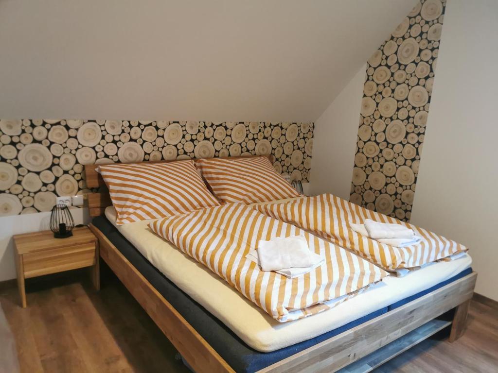 Postel nebo postele na pokoji v ubytování Naše Borovka