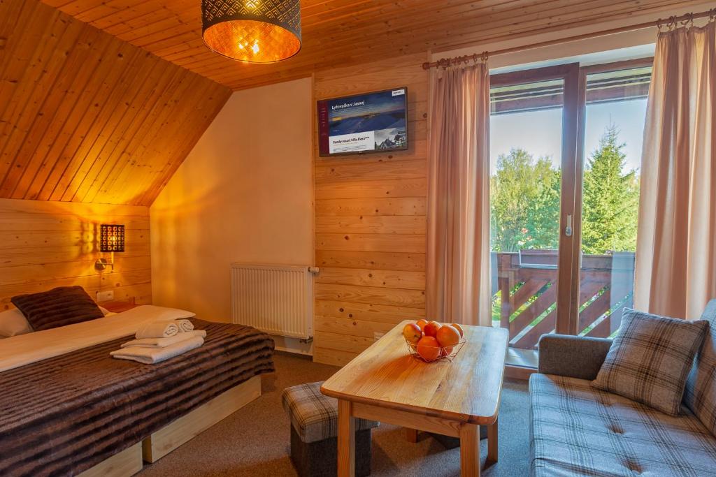 TV a/nebo společenská místnost v ubytování Apartmány a Štúdia Villa Flora