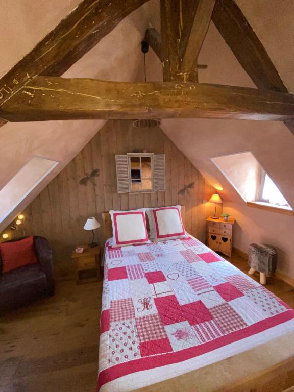 Кровать или кровати в номере Au Bois Normand