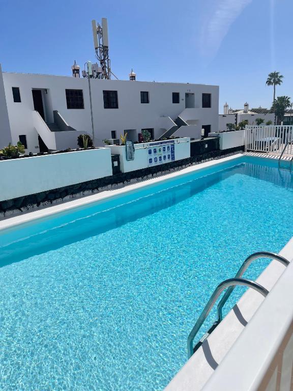 The swimming pool at or close to -MONTORIAN Apartments -LANZAROTE