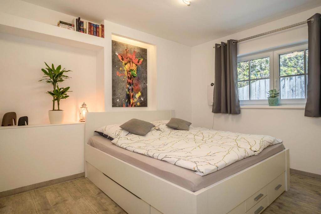Postel nebo postele na pokoji v ubytování Ferienwohnung Relax