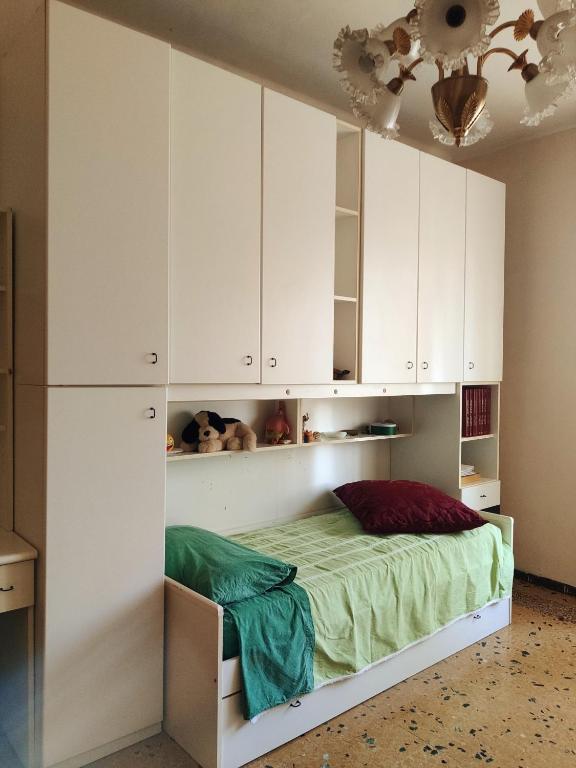 Posteľ alebo postele v izbe v ubytovaní Appartamento ultra comodo -Torino