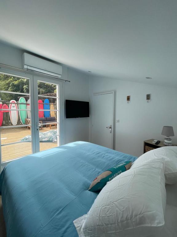 Krevet ili kreveti u jedinici u objektu Villa avec Piscine à 5 minutes de l’océan