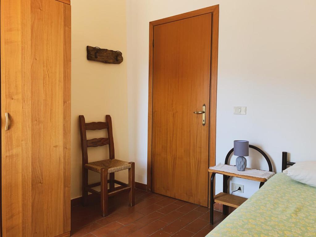 Postel nebo postele na pokoji v ubytování Rifugio La Mestà