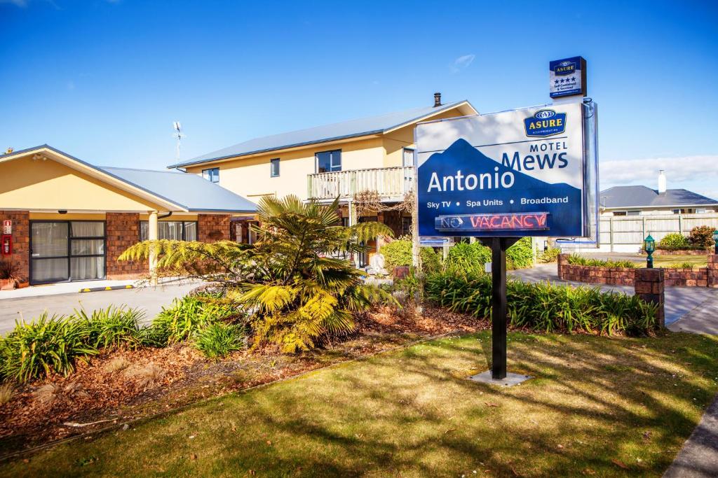 a sign for an antioch motel in front of a building at Antonio Mews Motel in Stratford