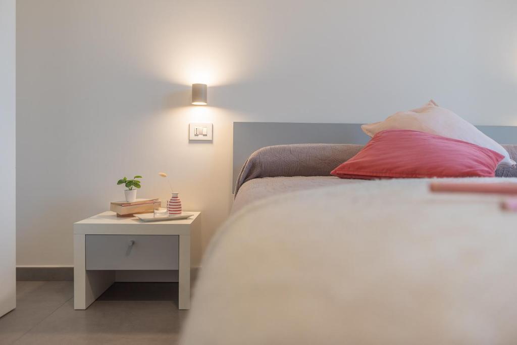 Postel nebo postele na pokoji v ubytování I GELSI B&B