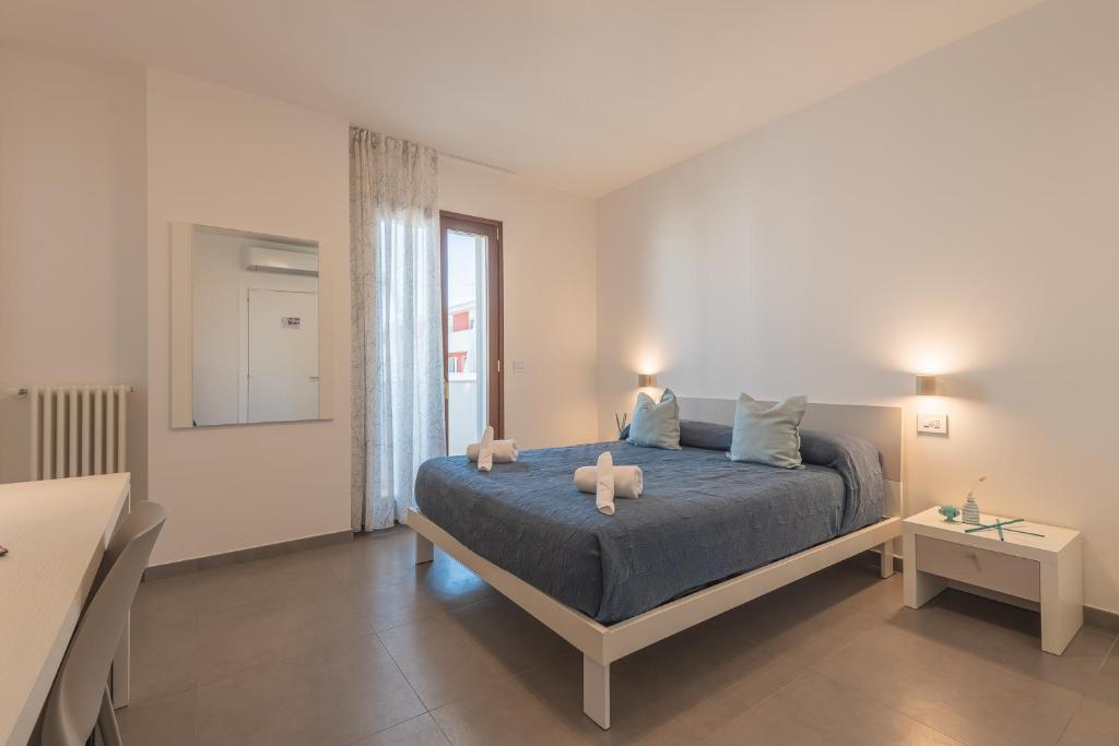 Postel nebo postele na pokoji v ubytování I GELSI B&B