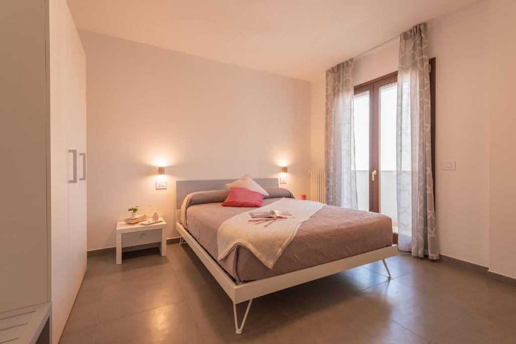 Postel nebo postele na pokoji v ubytování I GELSI B&B