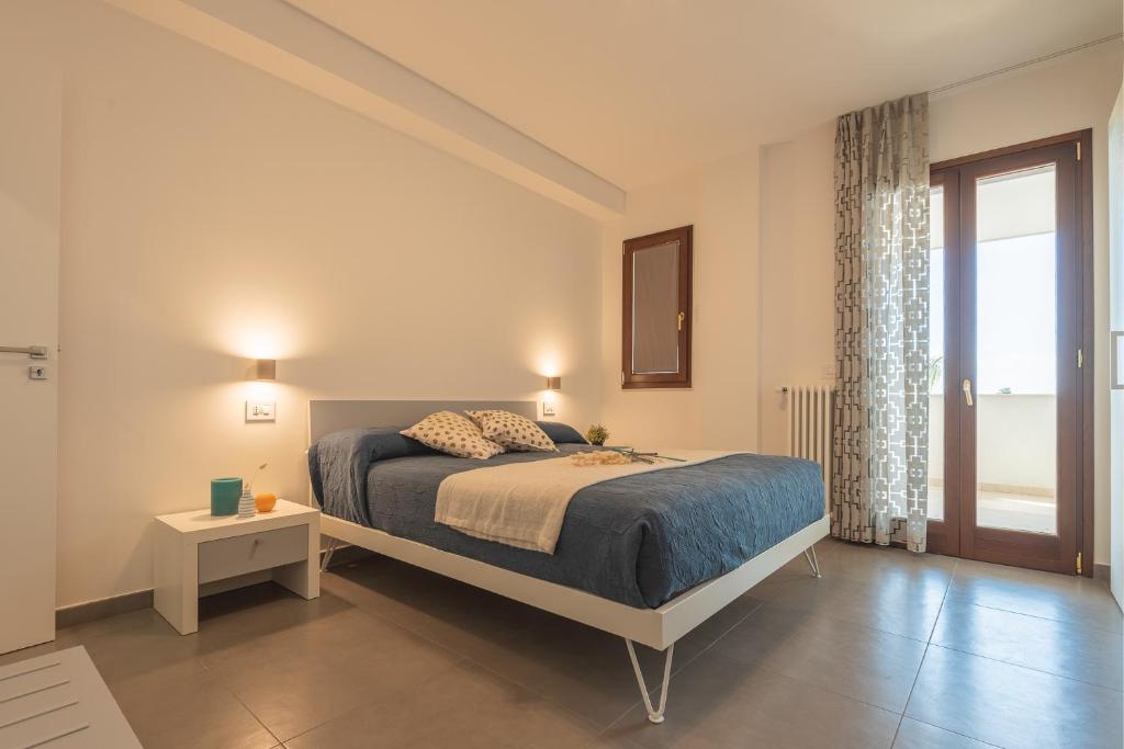 Postel nebo postele na pokoji v ubytování I GELSI B&B