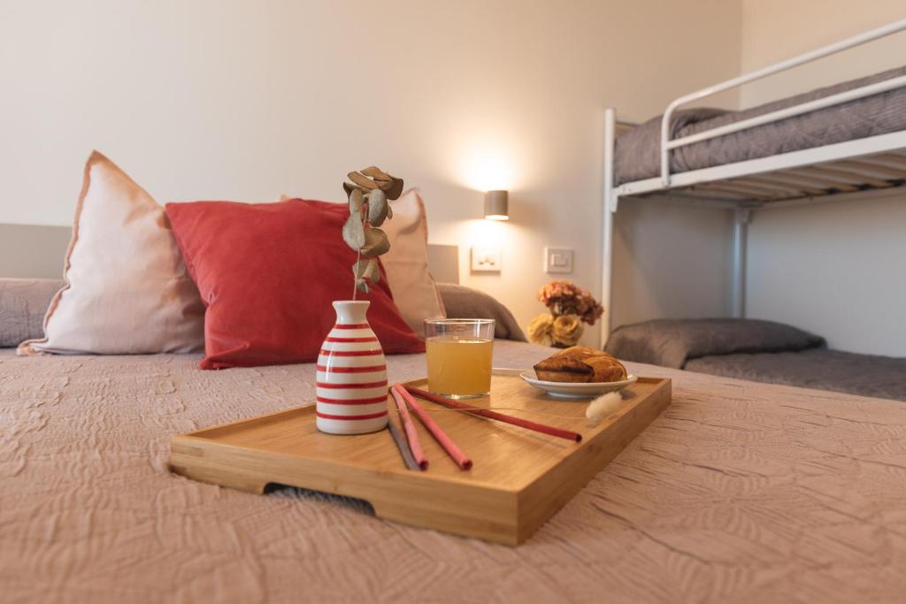 Postel nebo postele na pokoji v ubytování I GELSI B&B